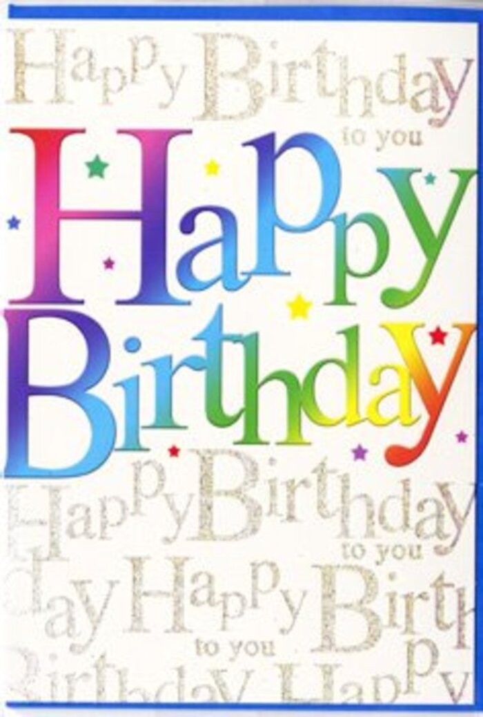 This elegant birthday card is captured in a well-lit image, its design blending modern colour with a hint of classic charm, much like the mix of old and new you see around Old Ford's streets. Across the center, the phrase "Happy Birthday" is printed in generous, bold letters that seem to float above the surface. Each letter wears a seamless gradient that journeys through a full rainbow spectrum-starting with deep crimson and berry shades, drifting into purples and ocean blues, then transitioning through vivid greens and finally into warm sunset oranges and yellows. The effect is as if a skilled florist has translated a rainbow bouquet into typography, each transition between colours as soft as petals nestled side by side. Draped lightly over and around the letters are tiny, scattered stars and shimmer-like flecks, creating the impression of confetti gently resting after a joyful toss. Behind this, the background is softly filled with repeating lines of gold cursive writing that whisper "Happy Birthday to you" in a delicate script. The gold appears slightly raised and reflective, catching any nearby light, like the glint of sunshine on windows along the canals near Old Ford during a clear morning. The paper itself looks smooth and substantial, with a satin sheen that promises a pleasant tactile feel when held. The overall mood is one of affectionate celebration: bright, optimistic, and thoughtfully styled. It is the sort of card you might choose to accompany a hand-delivered birthday bouquet arriving from a trusted local florist, bringing colour and joy to a home tucked just off the Roman Road or close to the quieter residential lanes of Old Ford.